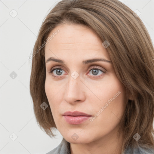 Neutral white young-adult female with medium  brown hair and grey eyes