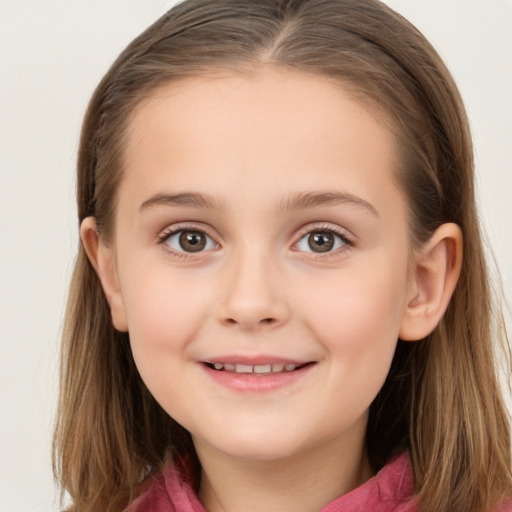 Joyful white child female with long  brown hair and brown eyes