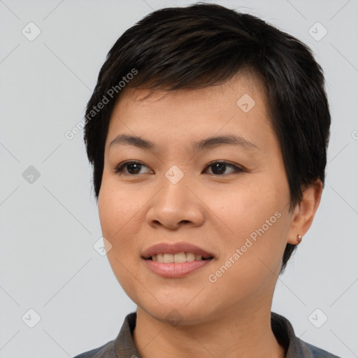 Joyful asian young-adult female with short  black hair and brown eyes