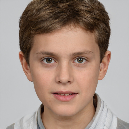 Joyful white child male with short  brown hair and grey eyes