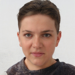 Neutral white young-adult female with short  brown hair and brown eyes