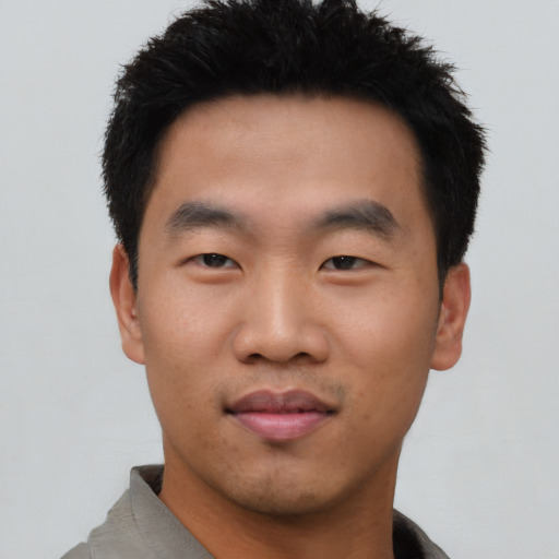 Neutral asian young-adult male with short  black hair and brown eyes