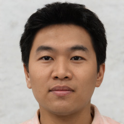 Neutral asian young-adult male with short  black hair and brown eyes