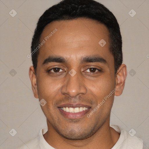 Joyful white young-adult male with short  black hair and brown eyes