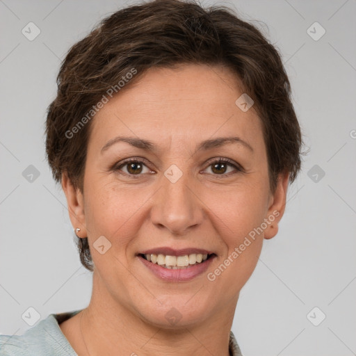 Joyful white adult female with short  brown hair and brown eyes