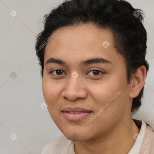 Joyful latino young-adult female with short  brown hair and brown eyes