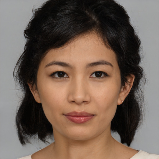 Neutral asian young-adult female with medium  brown hair and brown eyes