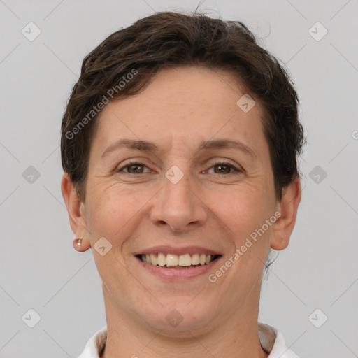 Joyful white adult female with short  brown hair and brown eyes