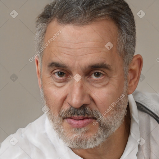 Joyful white middle-aged male with short  brown hair and brown eyes