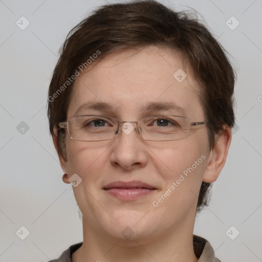 Joyful white adult female with short  brown hair and brown eyes