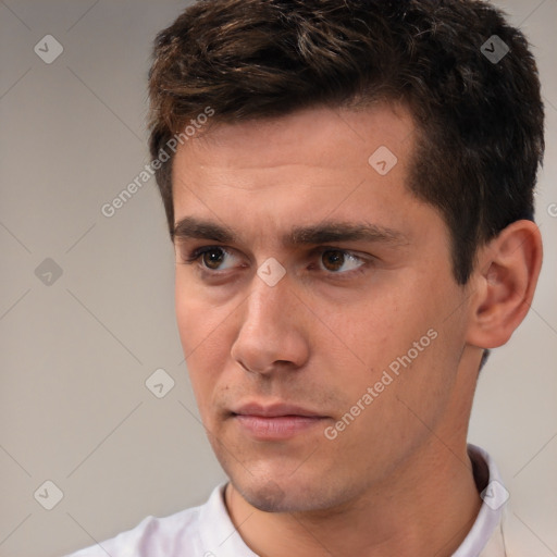 Neutral white young-adult male with short  brown hair and brown eyes