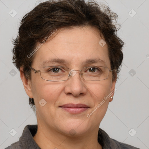 Joyful white adult female with short  brown hair and grey eyes