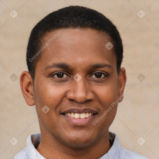 Joyful latino young-adult male with short  brown hair and brown eyes