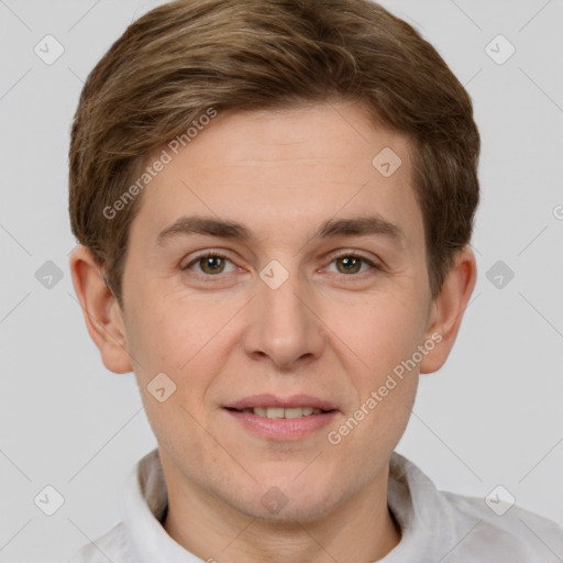 Joyful white adult male with short  brown hair and grey eyes