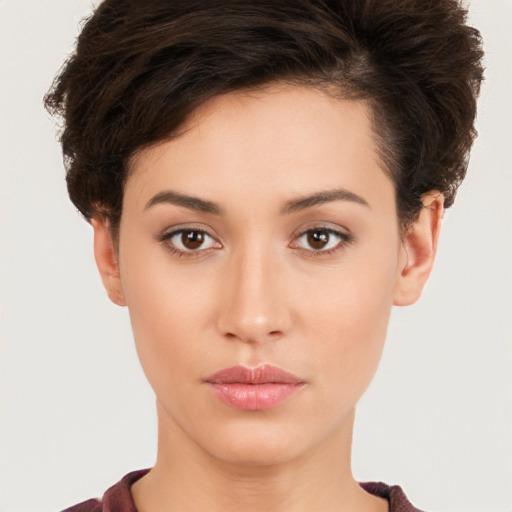 Neutral white young-adult female with short  brown hair and brown eyes