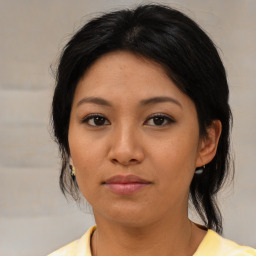 Neutral asian young-adult female with medium  brown hair and brown eyes