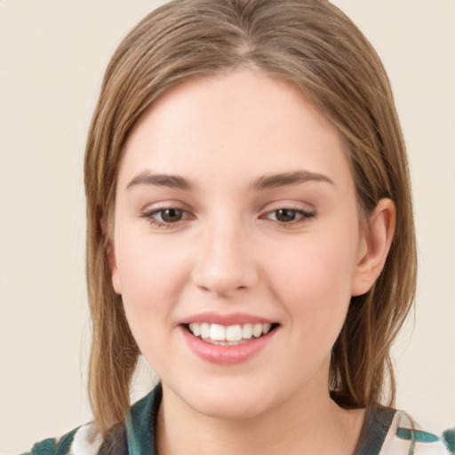 Joyful white young-adult female with medium  brown hair and green eyes