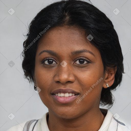 Joyful black young-adult female with medium  brown hair and brown eyes