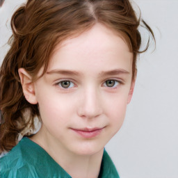 Joyful white child female with short  brown hair and grey eyes