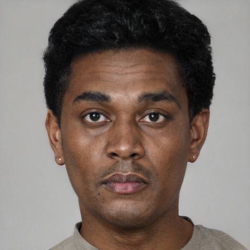 Neutral black young-adult male with short  black hair and brown eyes
