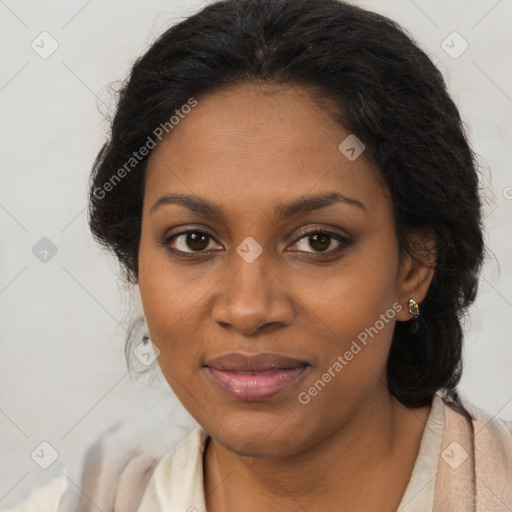 Joyful black young-adult female with long  brown hair and brown eyes