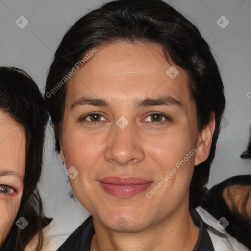 Joyful white adult female with medium  brown hair and brown eyes