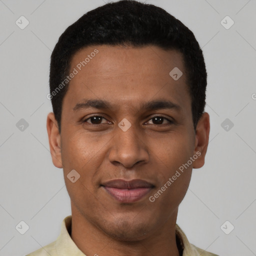 Joyful black young-adult male with short  black hair and brown eyes