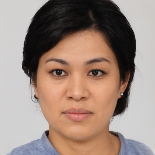 Neutral asian young-adult female with medium  black hair and brown eyes