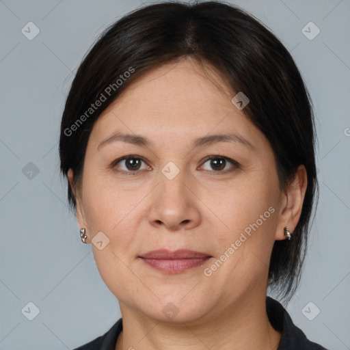 Joyful white adult female with medium  brown hair and brown eyes