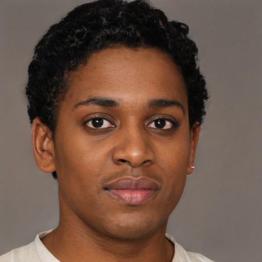 Neutral black young-adult female with short  brown hair and brown eyes