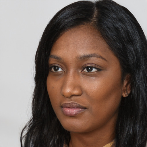 Neutral asian adult female with long  black hair and brown eyes