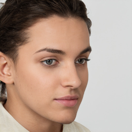 Neutral white young-adult female with short  brown hair and brown eyes