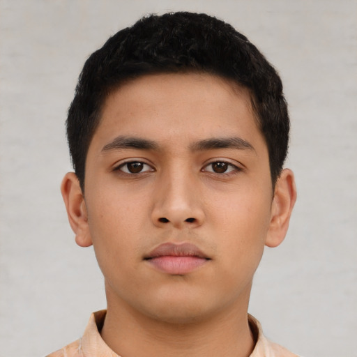 Neutral latino young-adult male with short  brown hair and brown eyes