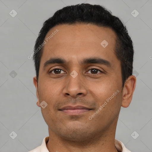 Neutral latino young-adult male with short  black hair and brown eyes
