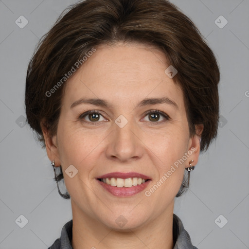 Joyful white adult female with medium  brown hair and grey eyes