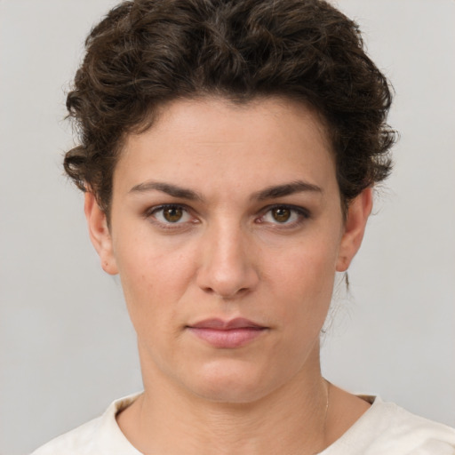 Neutral white young-adult female with short  brown hair and brown eyes