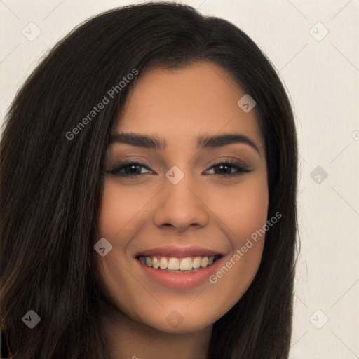 Joyful latino young-adult female with long  brown hair and brown eyes