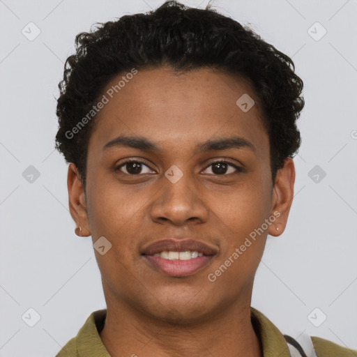 Joyful black young-adult male with short  brown hair and brown eyes