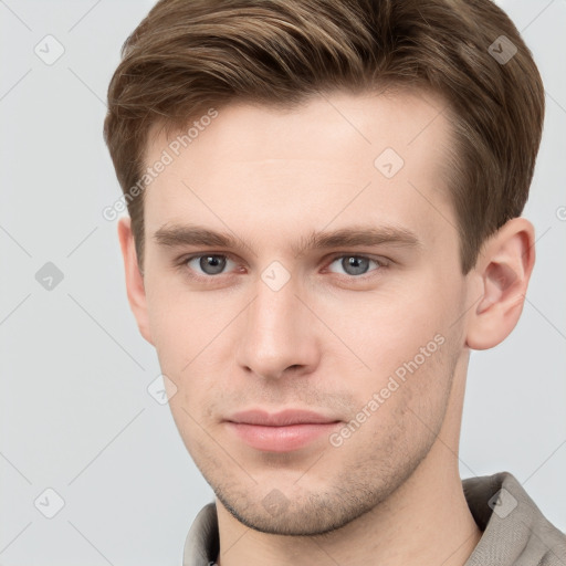 Neutral white young-adult male with short  brown hair and grey eyes