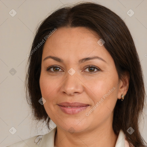 Joyful white adult female with medium  brown hair and brown eyes