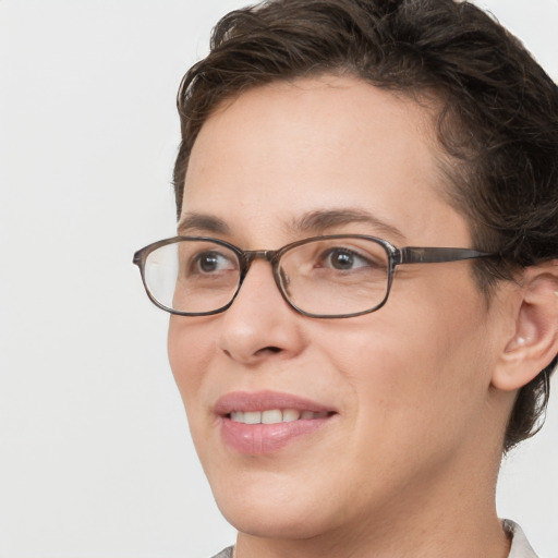 Joyful white adult female with short  brown hair and brown eyes