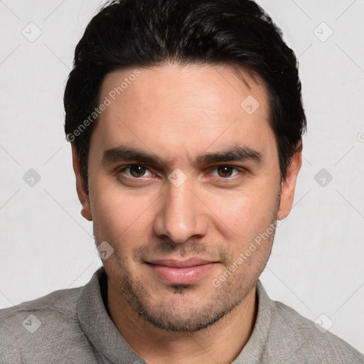 Joyful white young-adult male with short  black hair and brown eyes