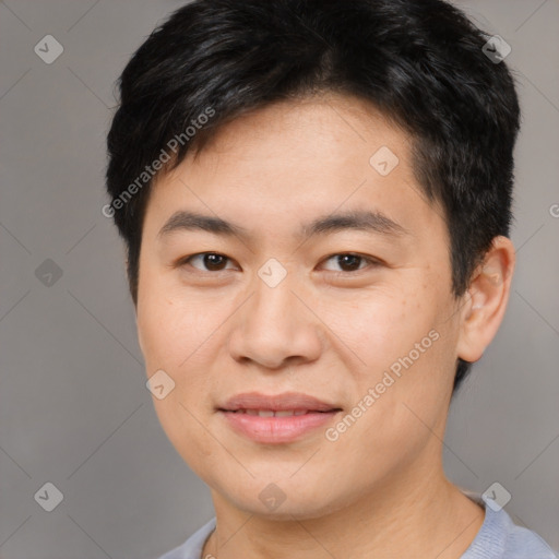 Joyful asian young-adult male with short  brown hair and brown eyes