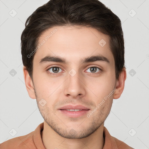 Neutral white young-adult male with short  brown hair and brown eyes