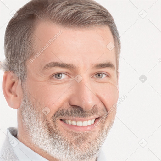 Joyful white adult male with short  brown hair and grey eyes