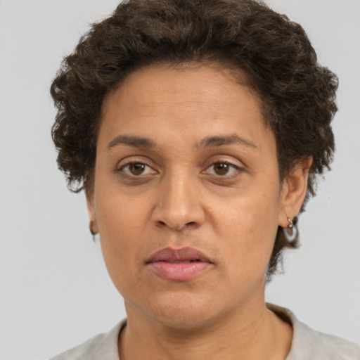 Neutral white adult female with short  brown hair and brown eyes