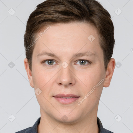 Joyful white young-adult female with short  brown hair and grey eyes