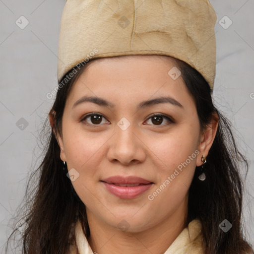 Joyful latino young-adult female with medium  brown hair and brown eyes