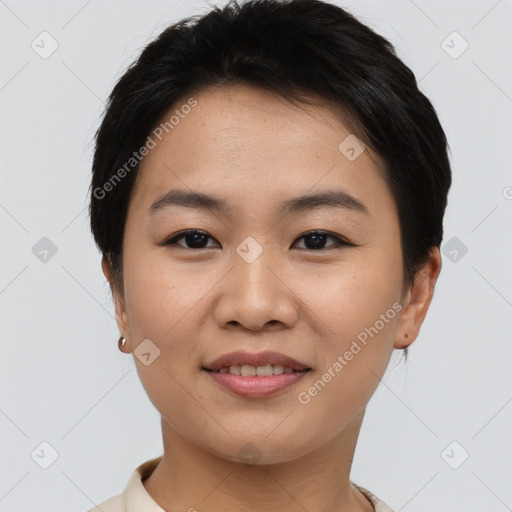 Joyful asian young-adult female with short  brown hair and brown eyes