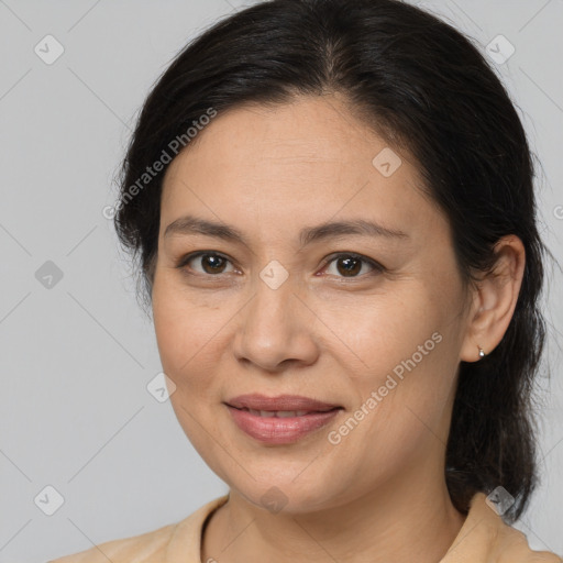 Joyful white adult female with medium  brown hair and brown eyes